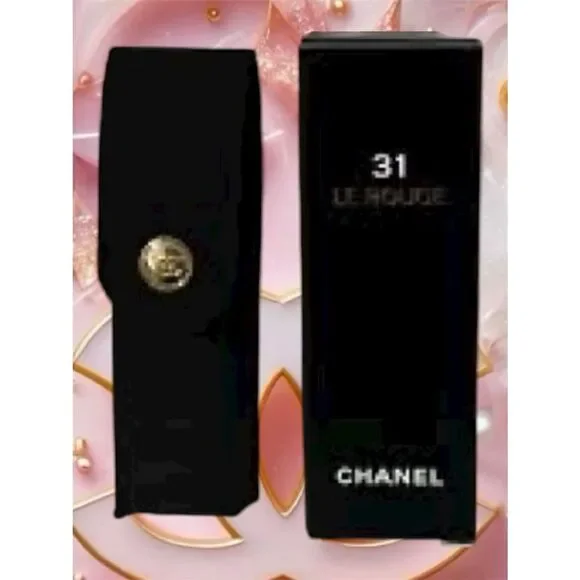 Chanel 31 Le Rouge lipstick case, a black quilted velvet pouch.