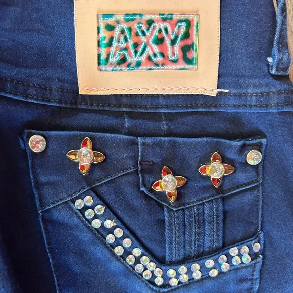 AXY vintage denim skinny jeans with embellished rhinestone bottoms