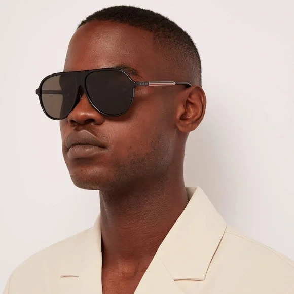 GUCCI GG0829SA 002 aviator sunglass black and ruthenium frame with green lenses.