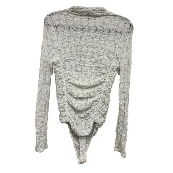Free people white crotchet style long sleeve bodysuit size medium