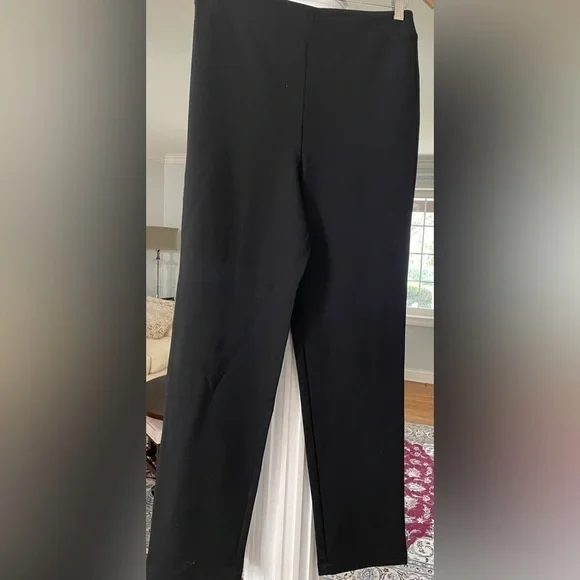 Joan Rivers women’s full length poll- on black pants size small, 66% Rayon.