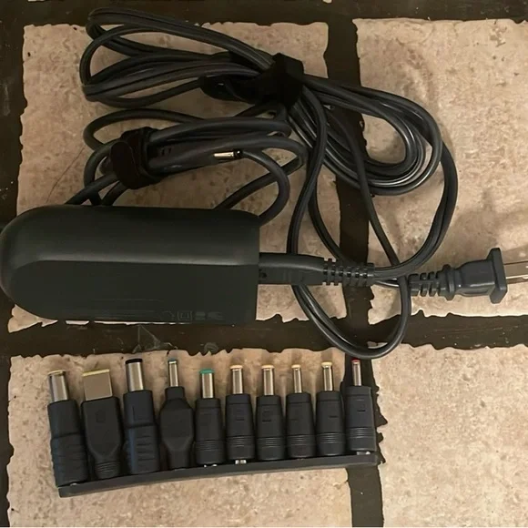 Onn. Laptop charger with 10 interchangeable tips