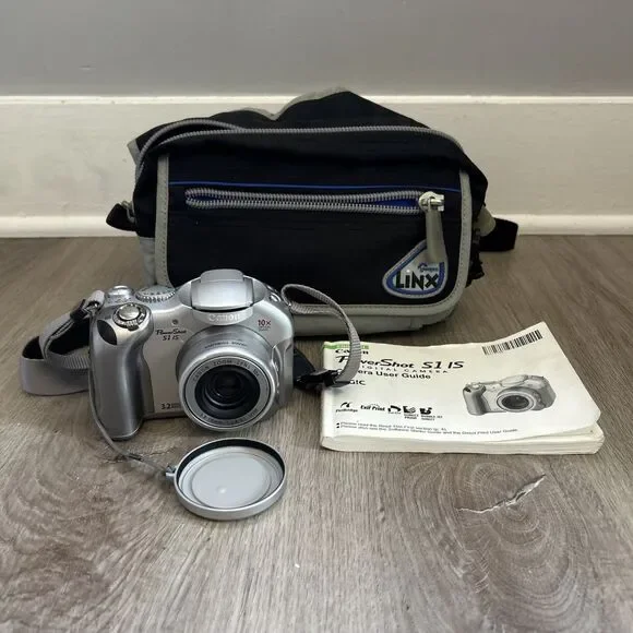 Canon PowerShot S1 IS PC1058 3.2MP Silver Digital Camera Powers On FOR PARTS
