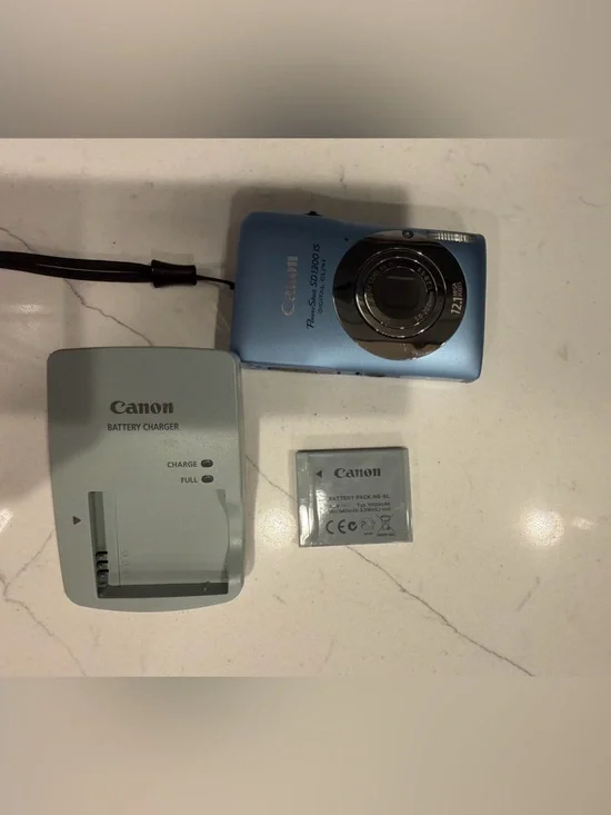 Canon Power Shot SD1300 IS digital camera features a 12.1-megapixel CCD sensor