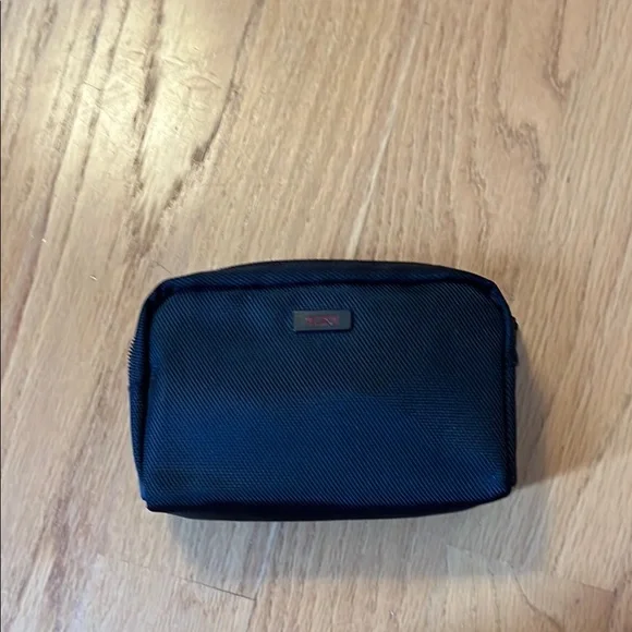 Tumi for Delta small black bag with sleep mask and socks