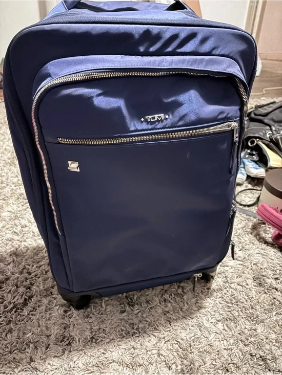 Tumi Carry-On Spinner rolling luggage