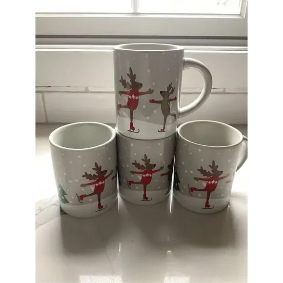 Set of 4 Crate & Barrel 12oz Ceramic Coffee Mugs Joan Anderson Skating Reindeer
