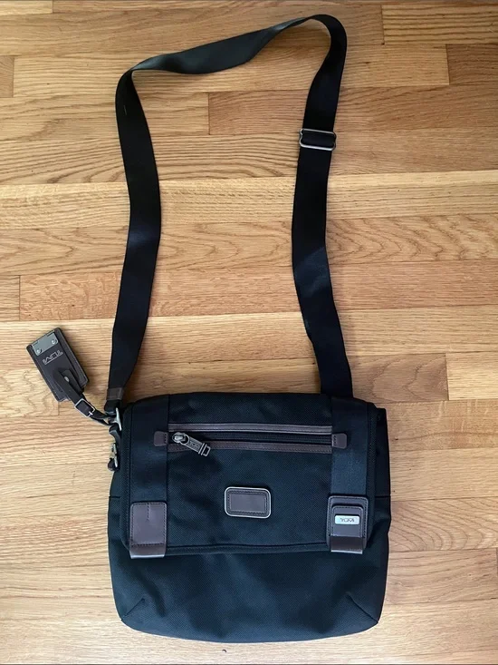 Tumi Black Messenger Bag with Brown Accents