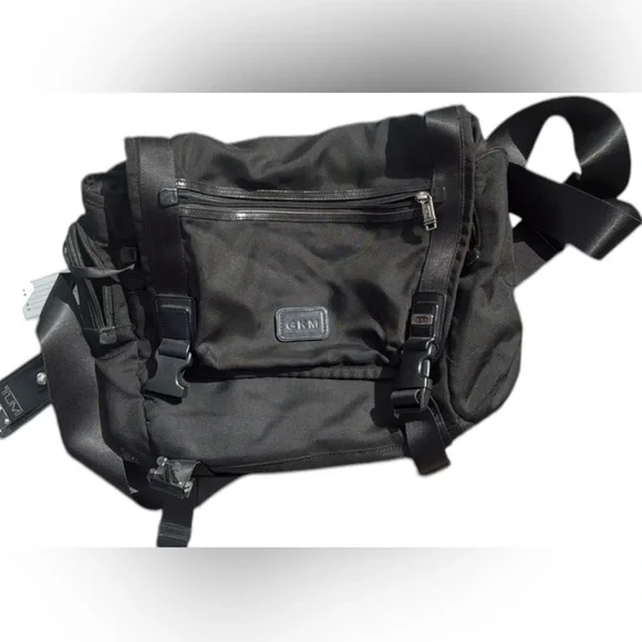 TUMI MESSENGER BAG.