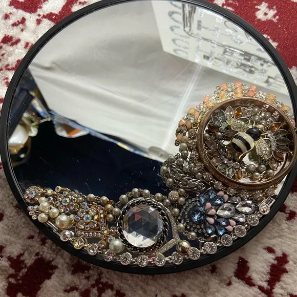 Hand Jeweled Mirror. Measurers Approximately 10 inches.