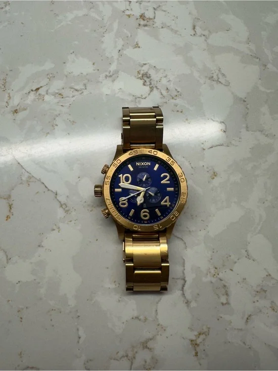 Nixon Gold-Tone Bracelet Watch with Blue Dial