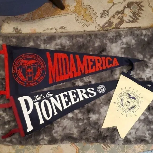 3‎ vtg. MNU  Midamerica Nazarene University felt pendants, pioneers