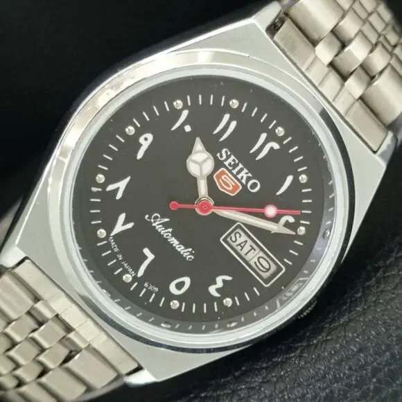Vintage 1976 Seiko Automatic Mens Silver Watch W/daydate & Black accents