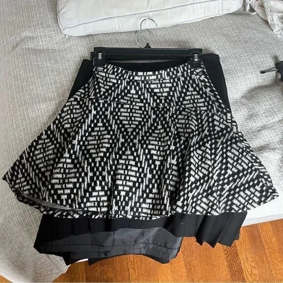 Aqua(Bloomingdales) black and white patterned circle skirt.