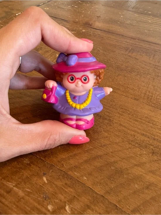 Fisher Price Little People Maggie with pink hat and purse as is
