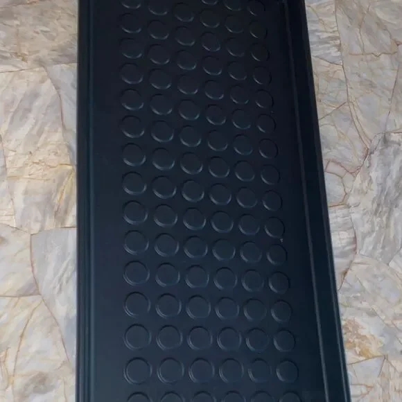 Black Rubber Tray em is the BAGGMUCK shoe tray from IKEA
