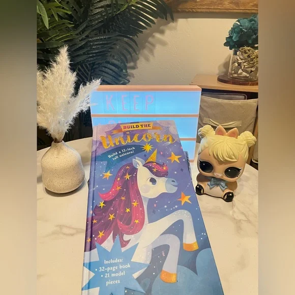 Build the Unicorn Kids Building Set, reading book, and Lear