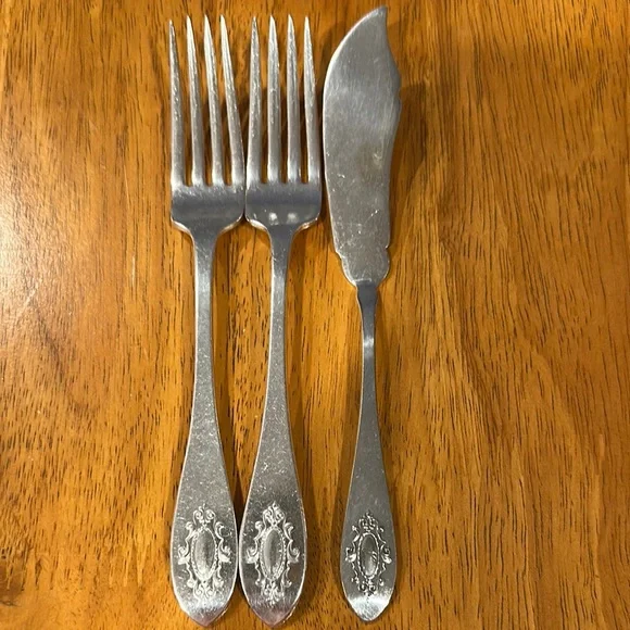 CV vintage silver plated forks and butter spreader. 7x1 forks.