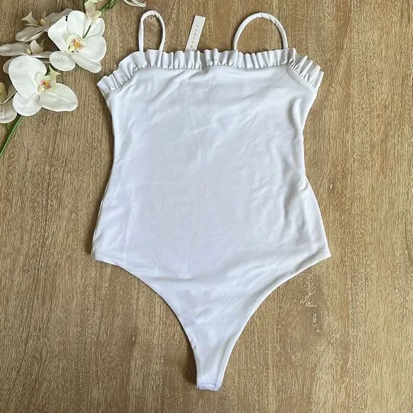 Susana Monaco Ruffle String Bodysuit in Sugar Size S