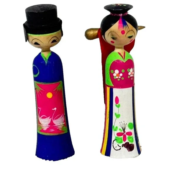 Handmade‎ wooden Kokeshi dolls with colorful designs