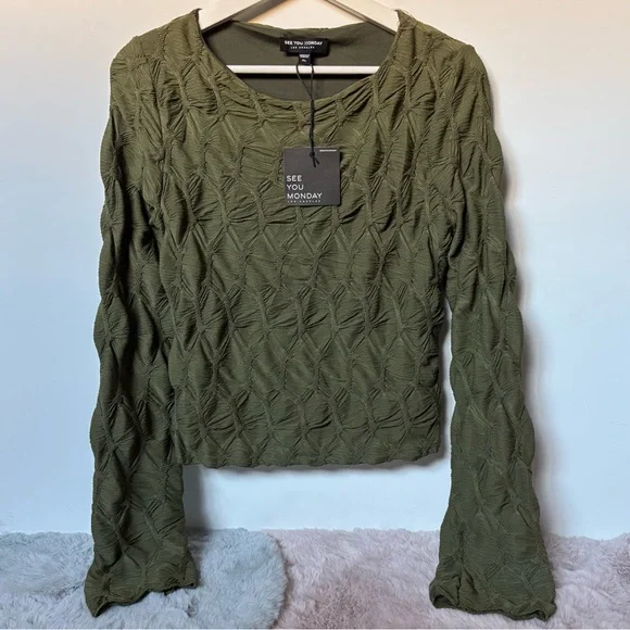 See you Monday green long sleeve texture top
