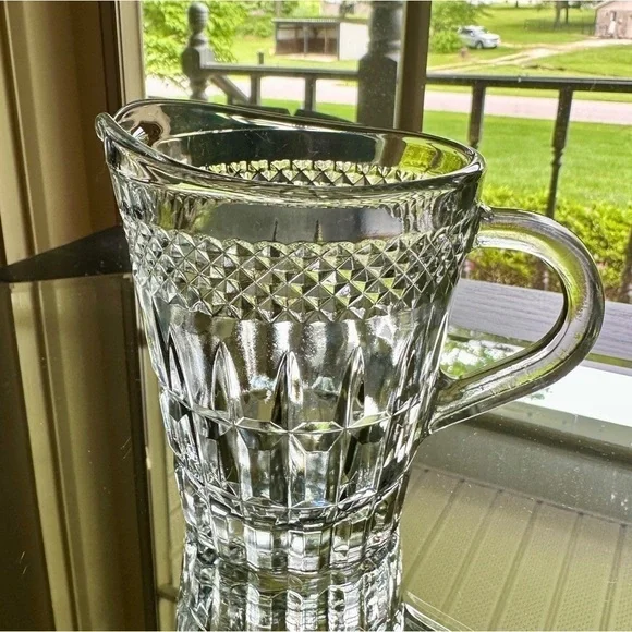 CLEAR PRESSED GLASS CREAMER. HAS COVETRO ITALY MARKED ON BOTTOM.