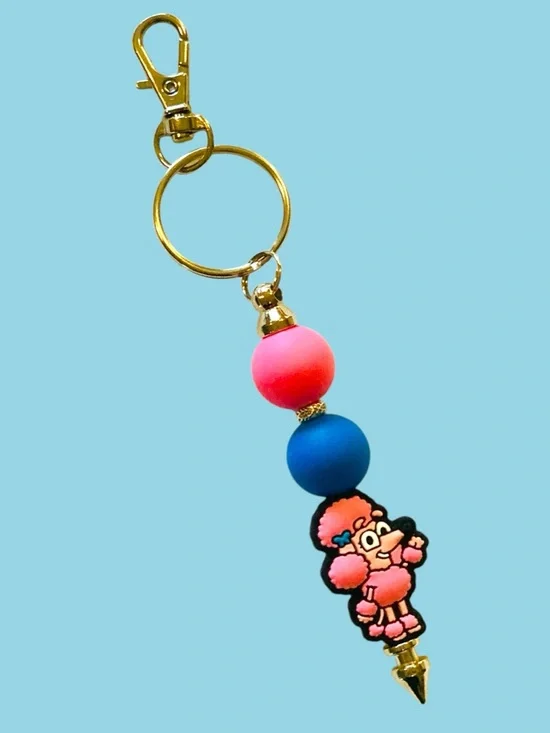 Pink Coco (Bluey’s classmate & friend).  Keychain or backpack charm. Handmade.