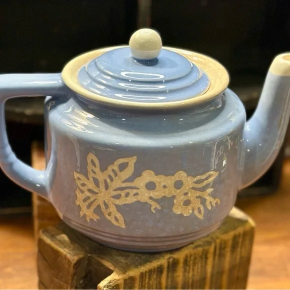 Vintage Blue Ceramic Teapot with Floral Design and Lid