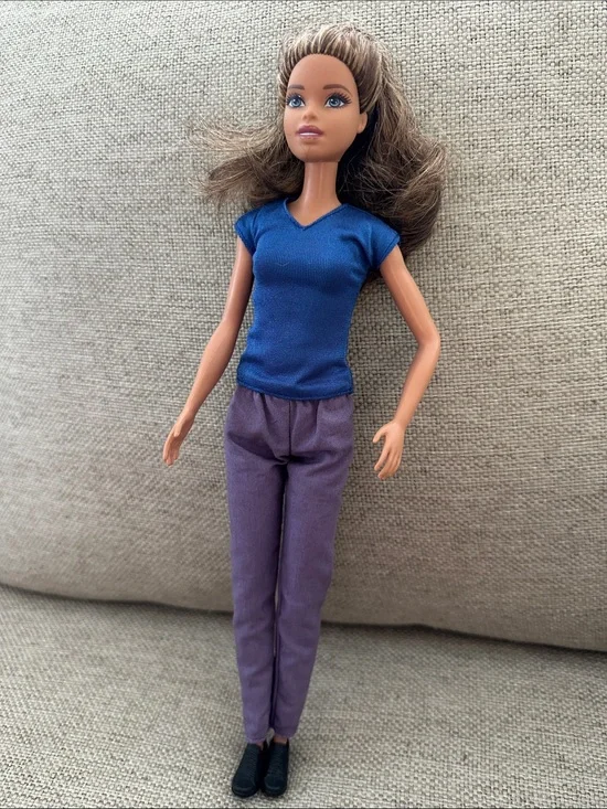 1990 Mattel Barbie Doll with random clothing