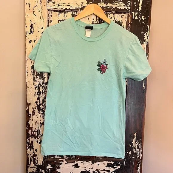 Santa Cruz Floral hand unisex T-shirt.