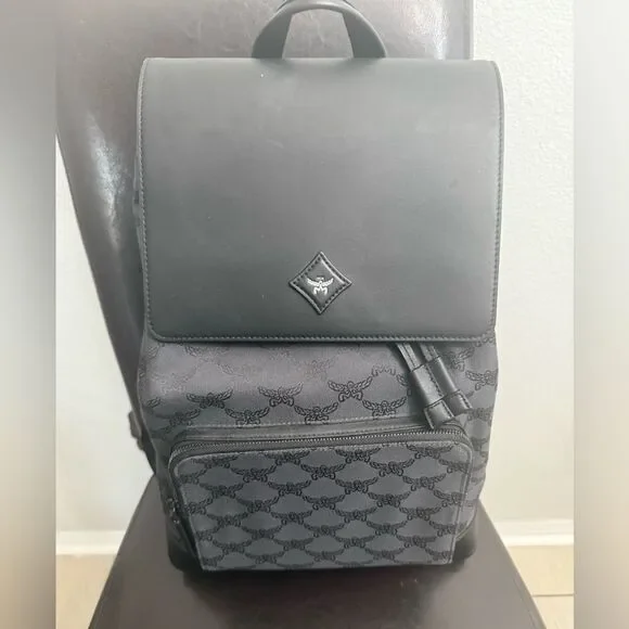 Brand new Mcm Black Backpack / travel bag / diaper bag etc fits laptop
