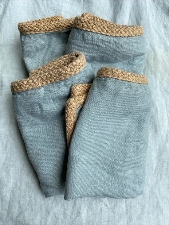 Set of 4 Pottery Barn blue 100% linen jute braid edge 20