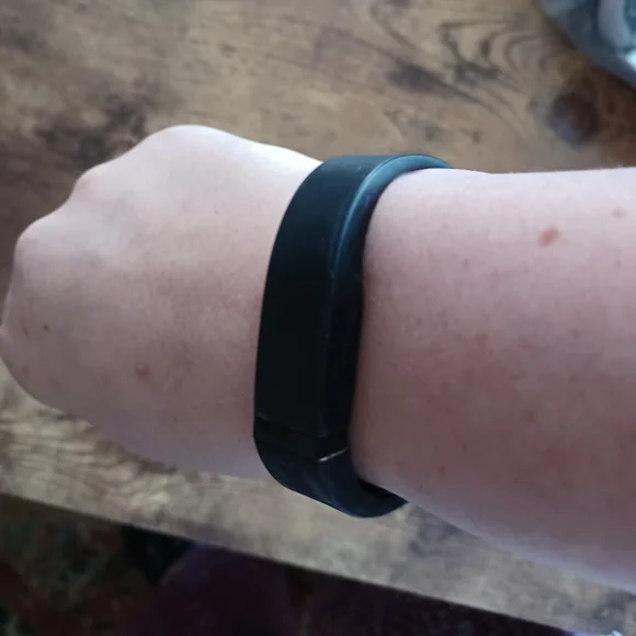 Fitbit Flex w/ black strap I will throw in a set extra straps