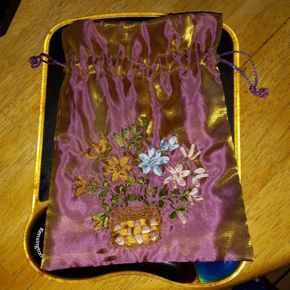 6x8 pretty detail flowers silky like material bag string closure.