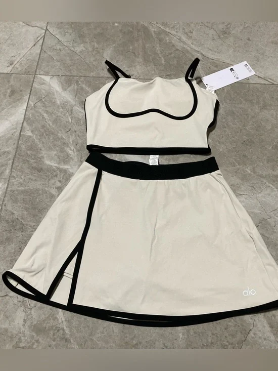 ALO Yoga Cream Two-Piece Crop Top and Skirt with Black Trim