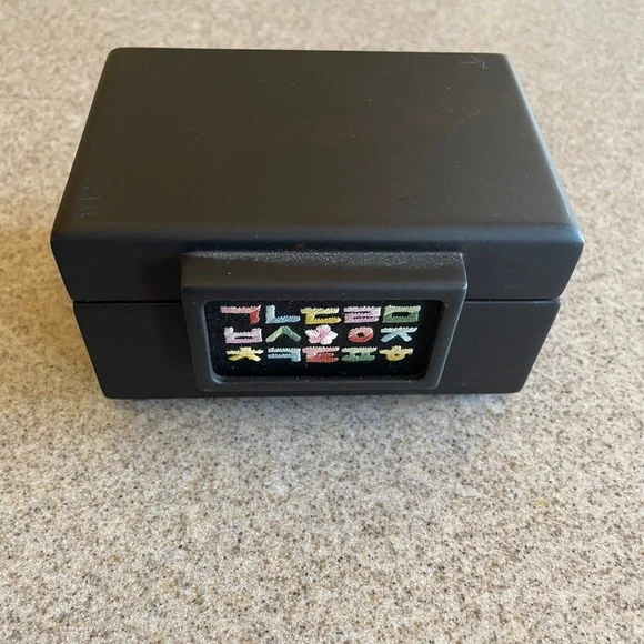 Black Jewelry Box with Colorful Symbols