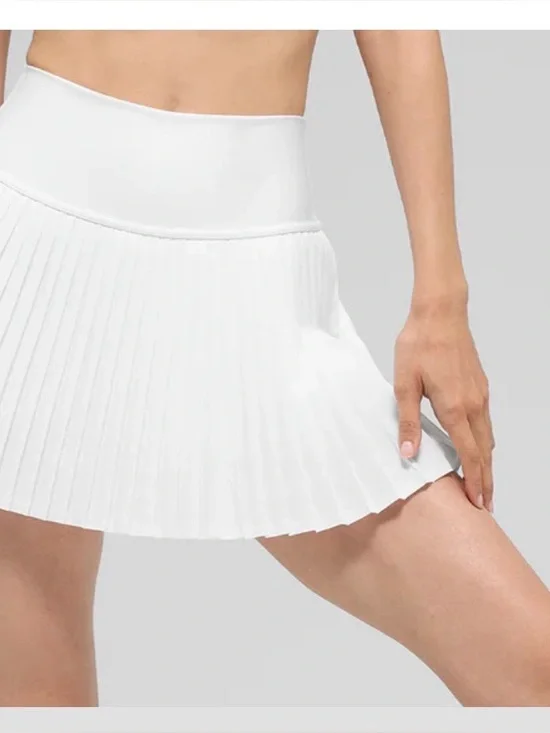 ALO Yoga Grand Slam White Pleated Skirt with Branded Tag