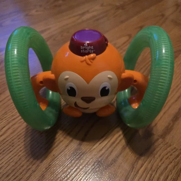 Bright Starts Roll & Glow Monkey  Colorful Rolls Sings Baby Infant Crawling Toy
