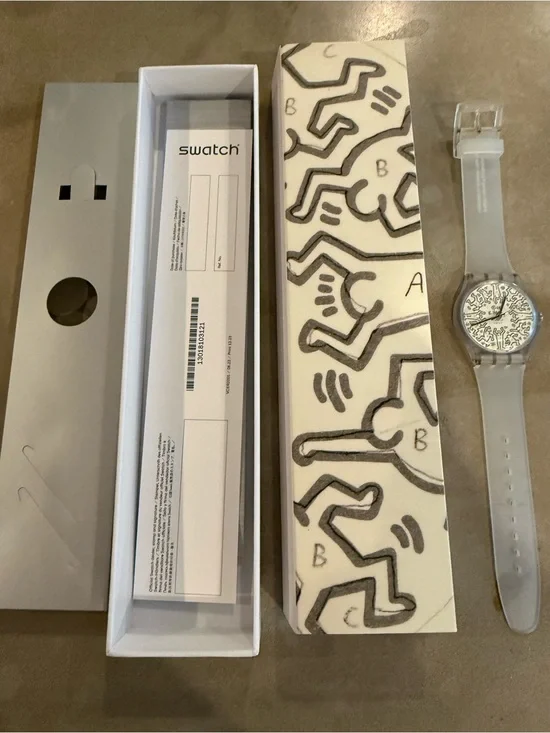 Swatch Translucent Strap Watch with White Patterned Dial