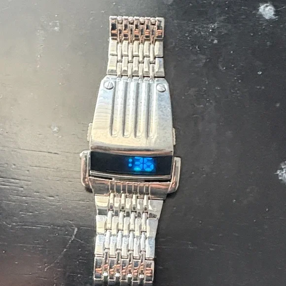 Elegant Silver Smartwatch with Blue Display