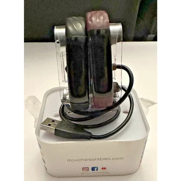 Two itouch slim fitness trackers and 2 chargers (not tested)