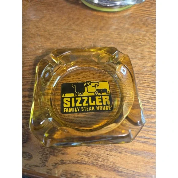 SIZZLER Family Steakhouse Vintage Amber Ashtray  3.5 In x 3.5 In USED Great Cond