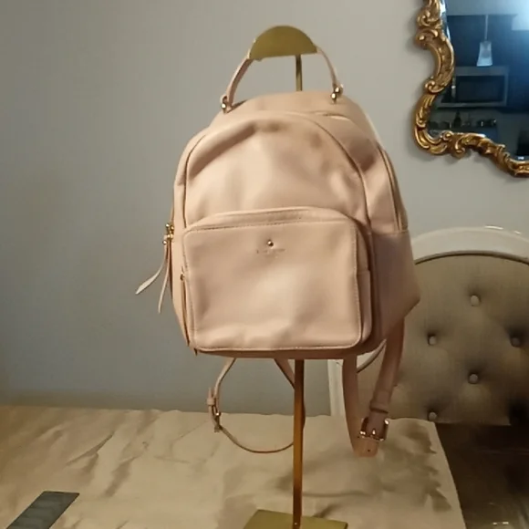 Kate Spade Elegant Pink Cream Backpack with gold Hardware