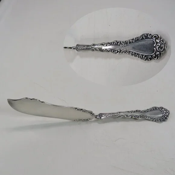 Webster Twisted Handle Butter Knife silver plated  S.L. & G.H. Rogers Company A1
