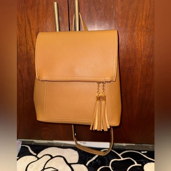 GORGEOUS CAMEL COLOR MINI BACKPACK WITH CONVERTIBLE STRAPS AND ACCENT TASSELS