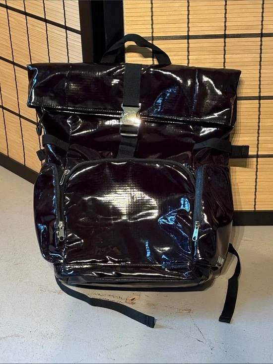 Isaac Mizrahi black patent leather rolltop backpack. IMNYC