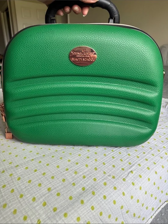 Young Living Green Case with Rose Gold Oval Emblem