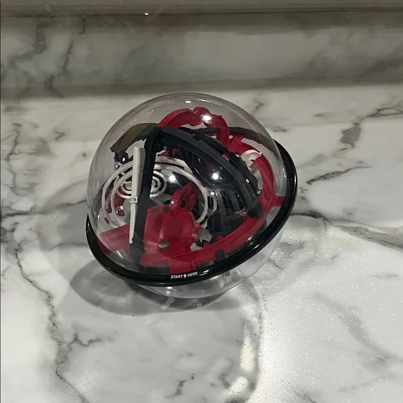 Perplexus Ball puzzle Interactive Red and Black Puzzle Sphere sharper‎ image