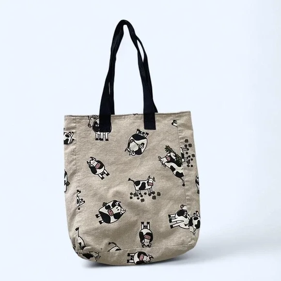 Beige canvas tote bag‎ with cartoon cow print pattern