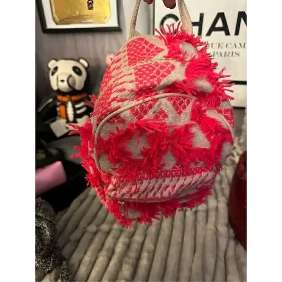 Neon red/pink boho festival backpack bag made in india